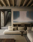 A interior setting featuring a large abstract painting with blue tones and vertical light streams, titled 'Eternal Life Lines' by Christina Cramer.