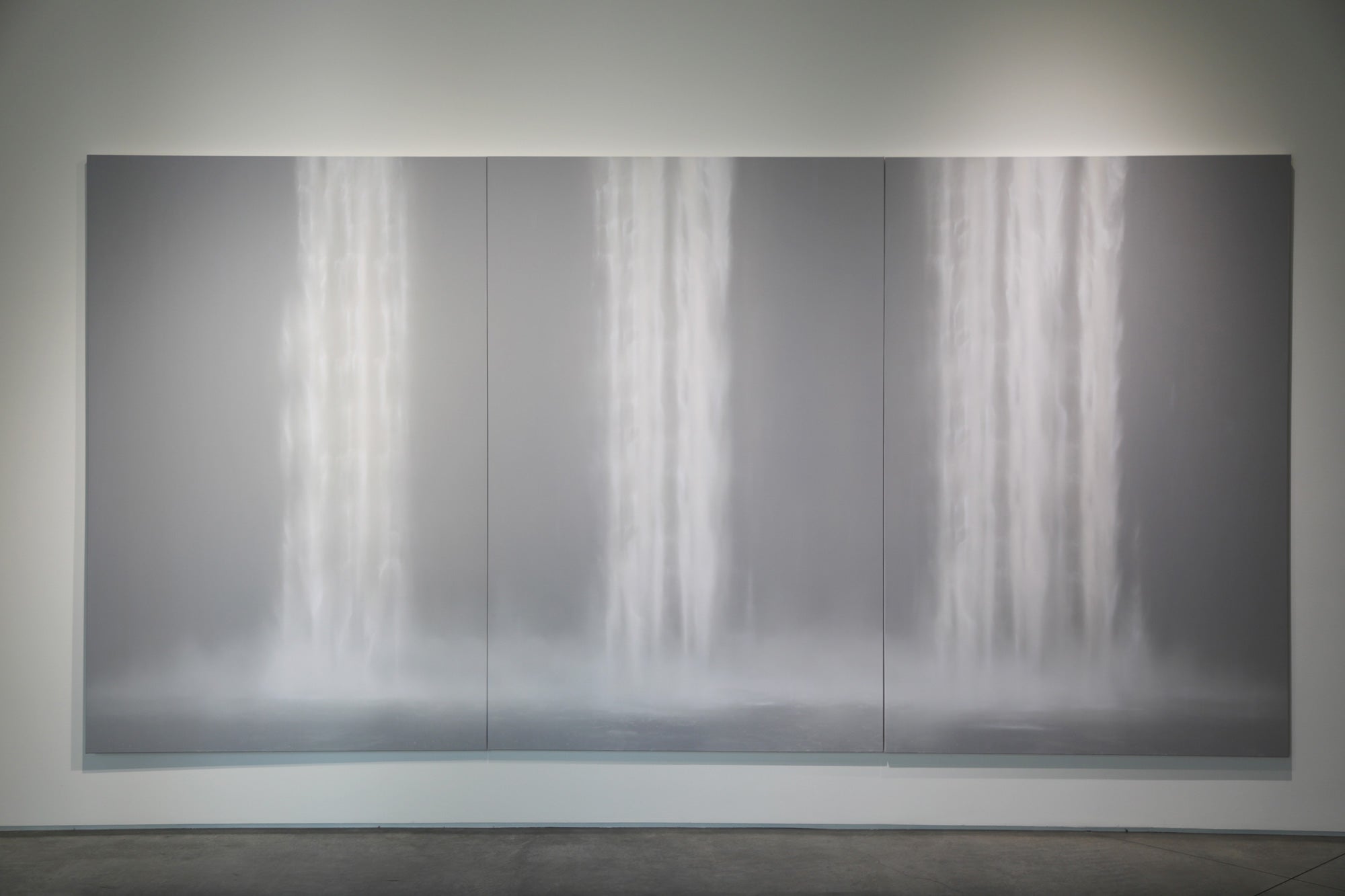 Modern abstract artwork with light and shadow on a gray background