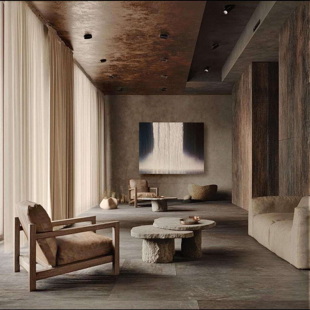 A zen living room with a waterfall artwork on the wall.