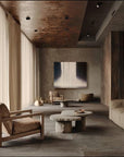 A zen living room with a waterfall artwork on the wall.