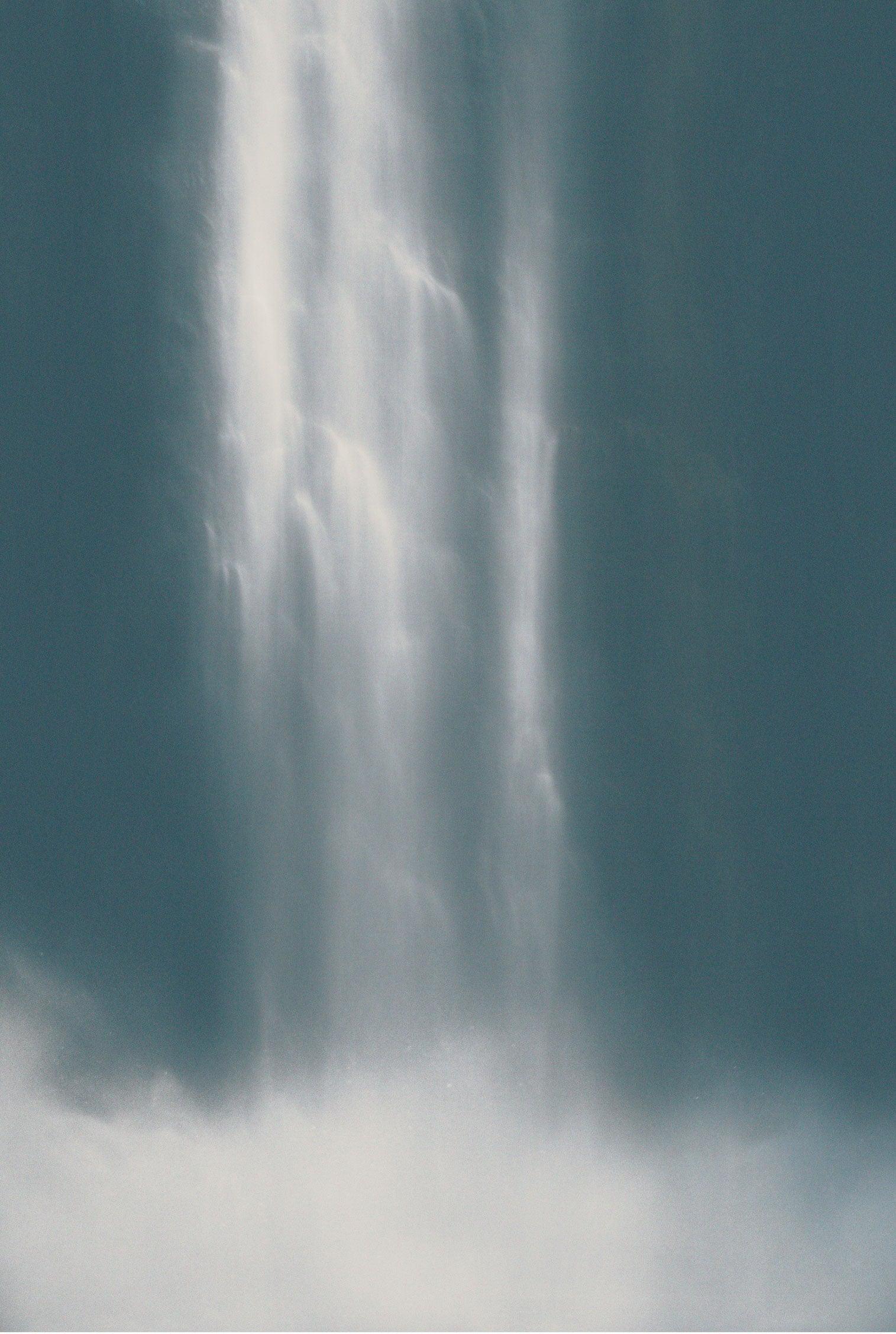 A abstract artwork print featuring inverted white lines on a blue background, with a blurred, ethereal appearance.